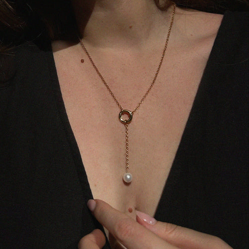 Aura Pearl Lariat Necklace - worn on model showing lariat drop length, gold ring detail, and freshwater pearl pendant | Token & Pearl